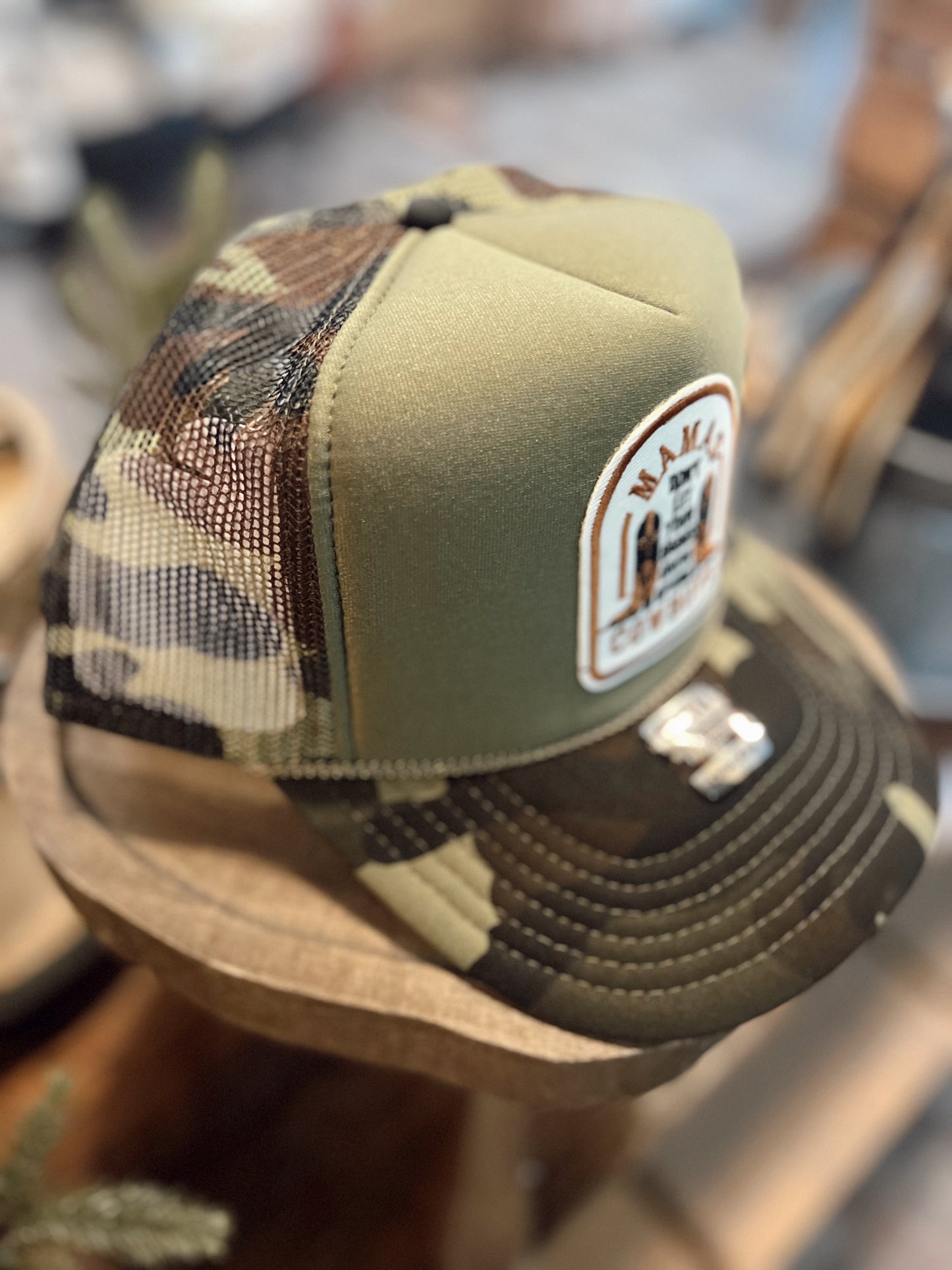 MAMAS DON’T LET YOUR BABIES TRUCKER HAT: CAMO
