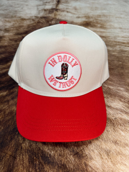 IN DOLLY WE TRUST TRUCKER: RED