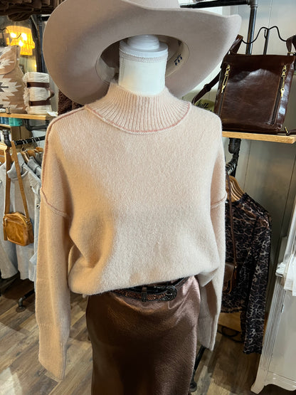 EXPOSED SEAM MOCK NECK SWEATER