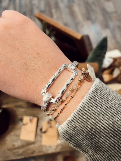 HAMMERED COIL SPRING BANGLE BRACELET